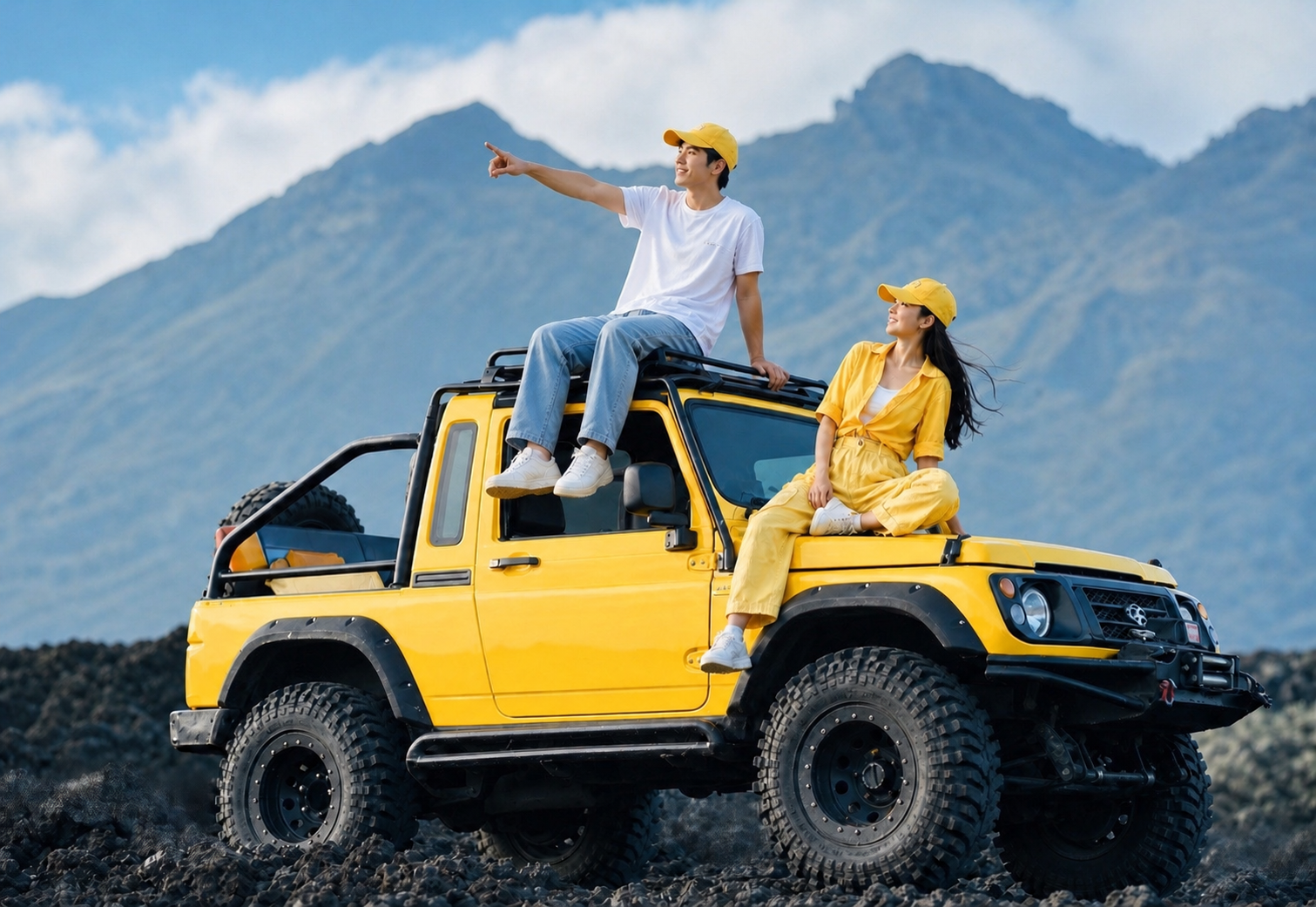 Mount Batur sunrise jeep tour in Bali with two guests enjoying volcano views during a shared off-road adventure
